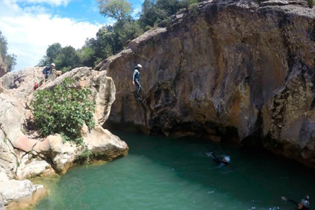 Jumping off the cliffs during the canyoning excursion in Sierra de Guara National Park.